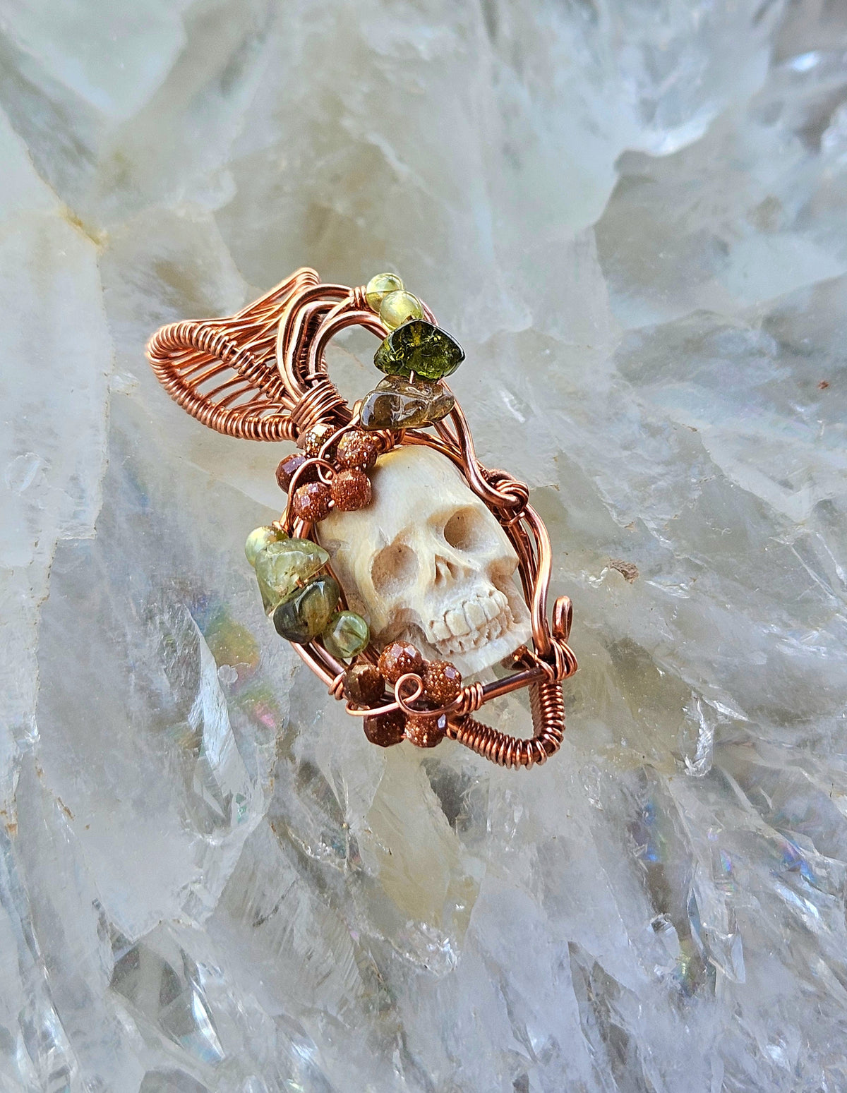 Overgrown garden skull pendant