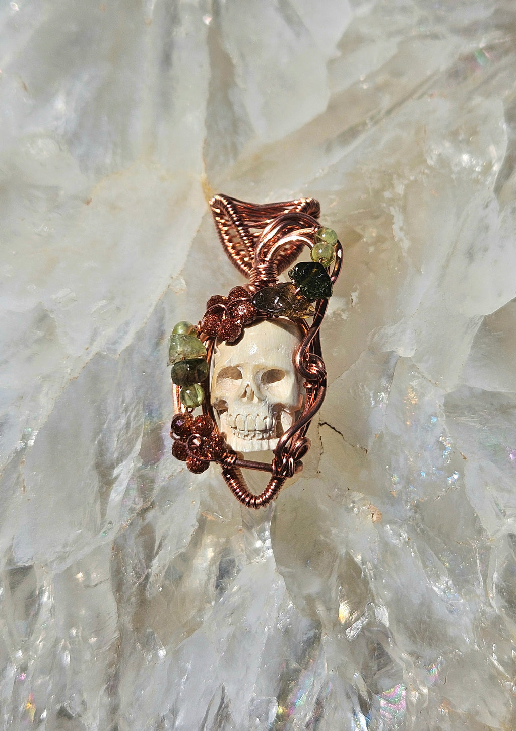 Overgrown garden skull pendant