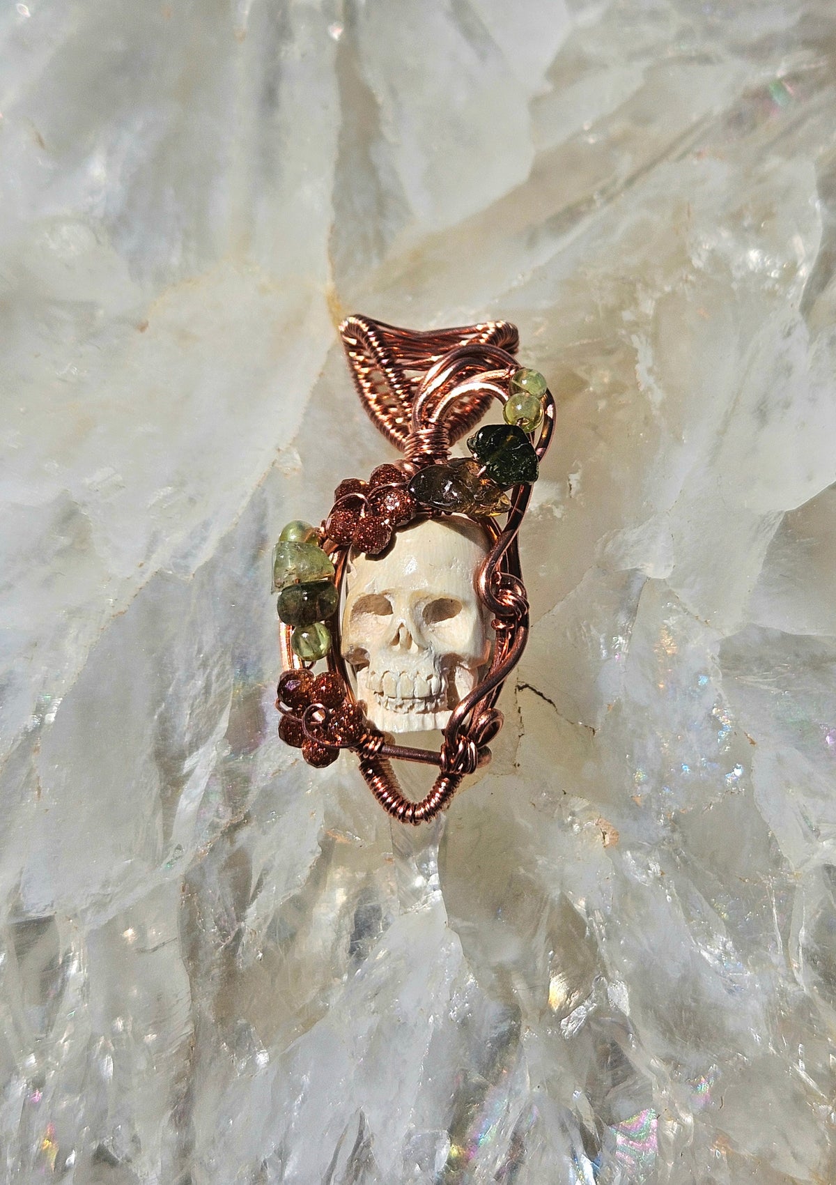 Overgrown garden skull pendant
